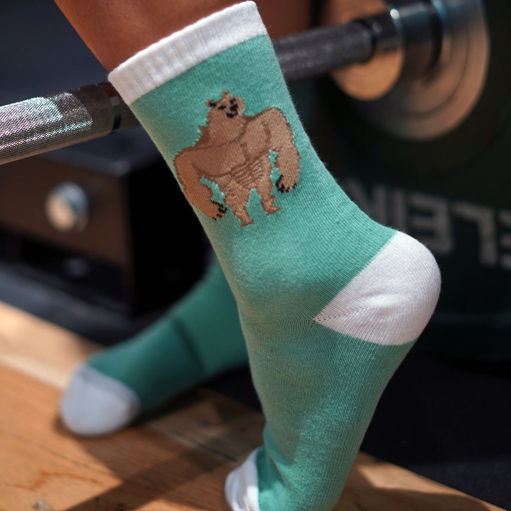 buff doge socks pastel green in the gym
