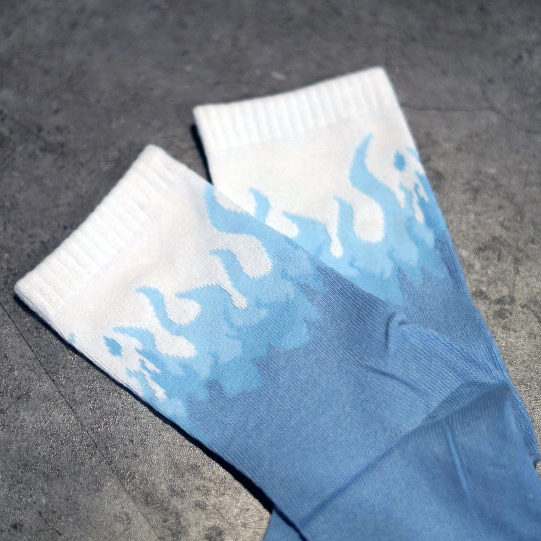 Pair of pastel blues fire design socks